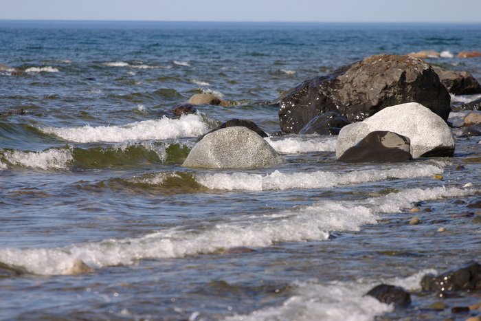 Waves and rocks on the shore of Lake Iliamna. 