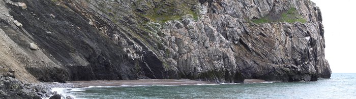 This small beach sits nearly at the tip of Cape Lisburne, surrounded by vertical bird-rookery cliffs.