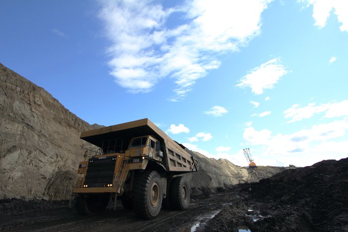 These trucks carry over 100 tons of coal in a load between Two Bull Ridge coal mine and the railroad.