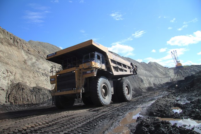 These trucks carry over 100 tons of coal in a load between Two Bull Ridge coal mine and the railroad.