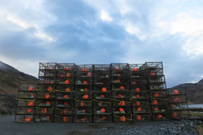 Crab pots stored along the edge of Captain's Bay, Unalaska