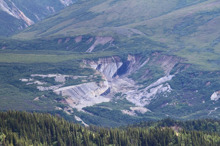 This strip mine is marked on USGS maps as Cripple Creek Mine, and the large coal seam visible in this photo suggests it's an old coal strip mine, but we have no other information on it.