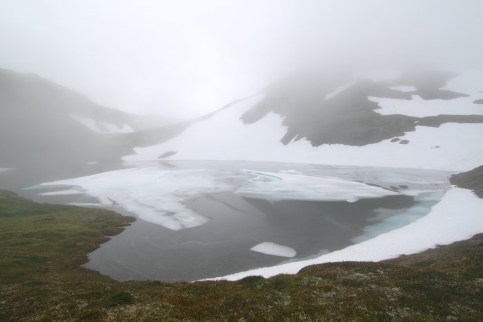 2500 feet above sea level is enough to leave ice on this alpine lake through July.