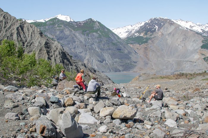 The crew of researchers take a rest after ascending to the highest water mark of the landslide generated tsunami, in Taan Fjord - in excess of 600 feet. 