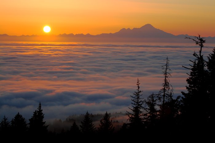 Sunset over a blanket of fog in Cook Inlet