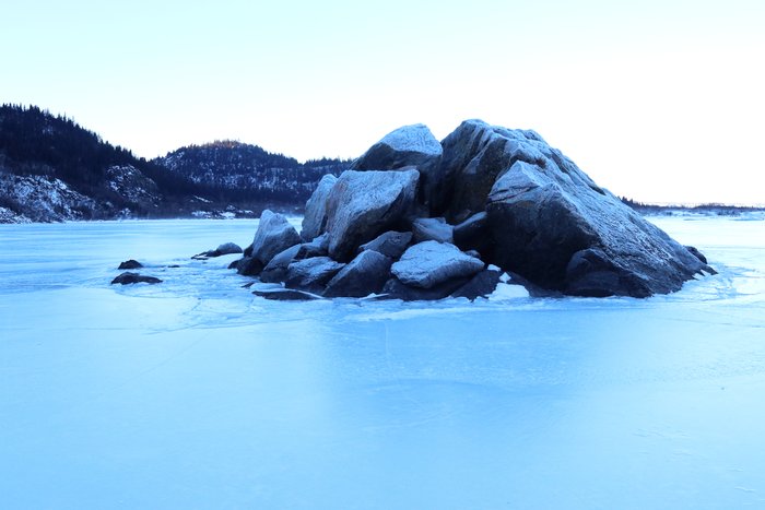 This rock juts from deep water in Grewingk Lake.