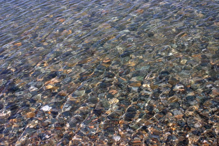 Pebbles underneath Lake Iliamna's crystal clear water. 