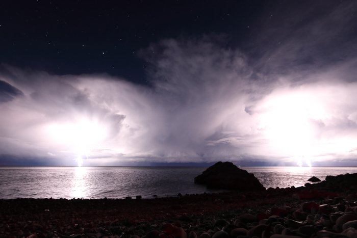 Bolts of lightning illuminate the waters of Lake Titicaca.