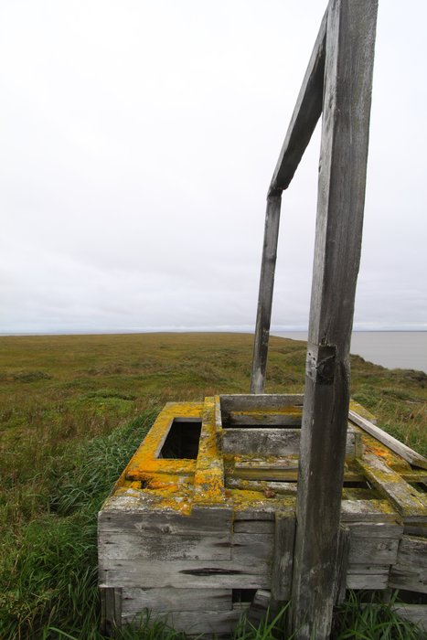 These photos depict signs of permafrost melting and coastal erosion.