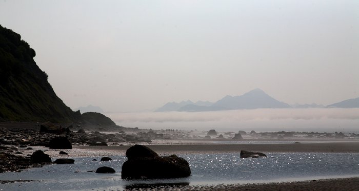 Mist softens the view across Kachemak Bay from the Homer beaches