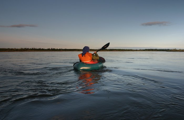 Hig paddling into the evening on the Nushagak River. 