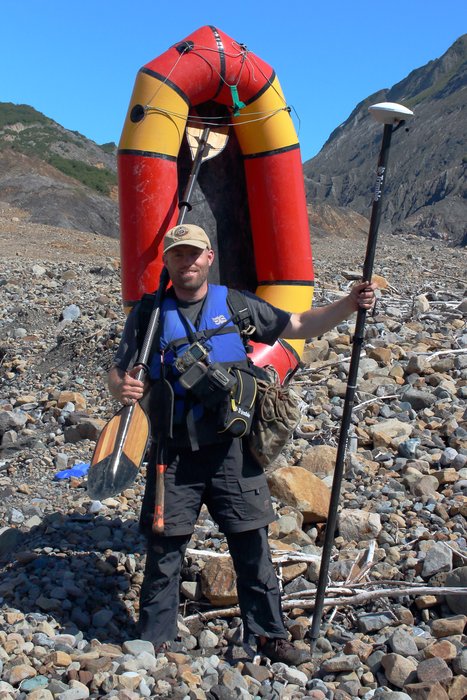 Andrew Mattox surveyed tsunami runup in some difficult to reach places - clambering through alder and paddling Taan Fjord with high-tech GPS instruments in-hand.