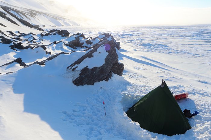 On the coast between Brevig Mission and Wales, on the south side of the Seward Peninsula, we had to find protected campsites nearly every night, building snow walls and anchoring the tent as best we could.