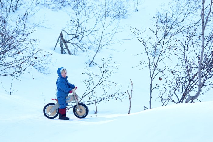 In April, snow melts smooth during the day, and freezes hard at night, creating the perfect kid bike surface.