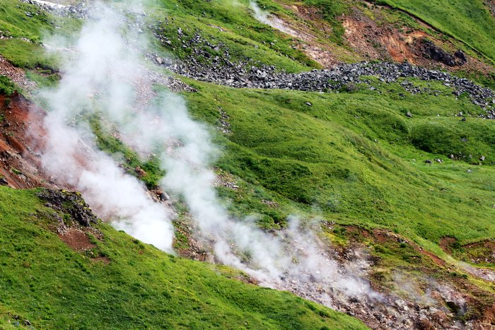 In the middle of Umnak Island, steam plumes rise from gashes in the earth, visible from miles away.
