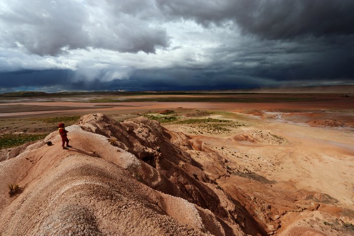 A small storm cell batters the red-brown waters of the Deseguadero.