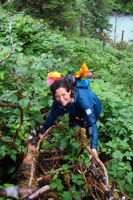 Thick salmonberry and blowdowns make for some of the most difficult bushwhacking. Alayne and Erin scouted this area, eliminating it as a potential trail route.