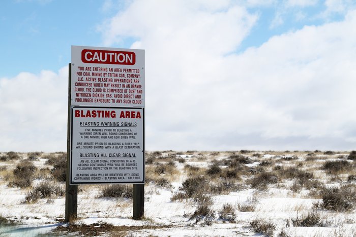 The massive blasting around Wyoming's coal mines prompts many warning signs like this.