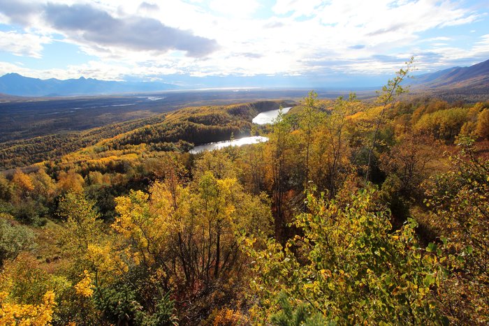 Looking along the length of Wishbone Hill, fall colors decorate rocky ridges surrounding Wishbone Lake.